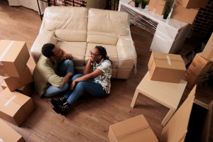 Young homeowners dreaming about apartment decor