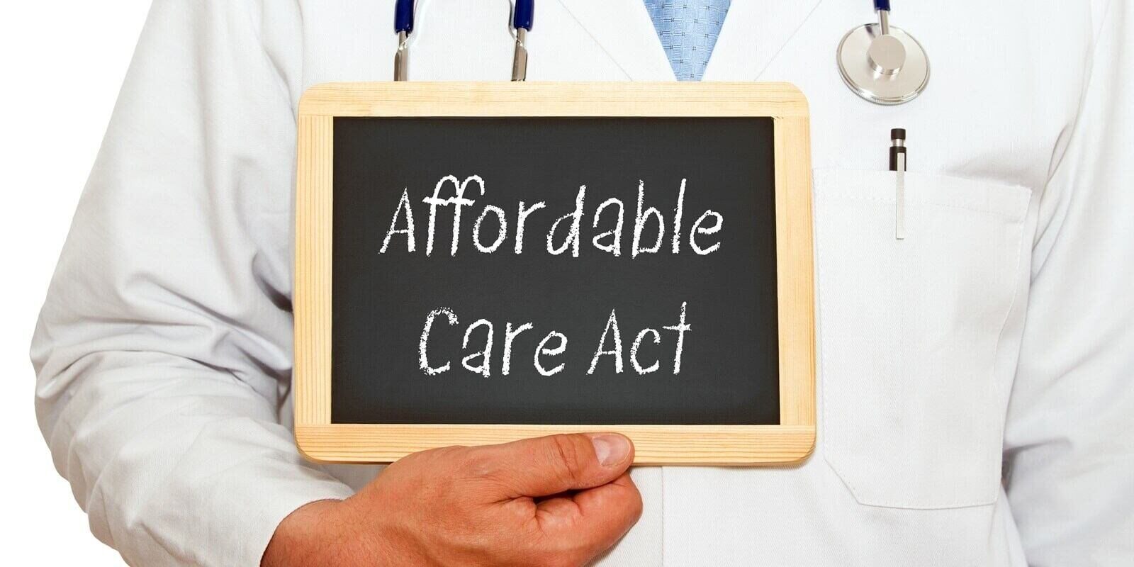 affordable care act - Doctor with chalkboard on white background